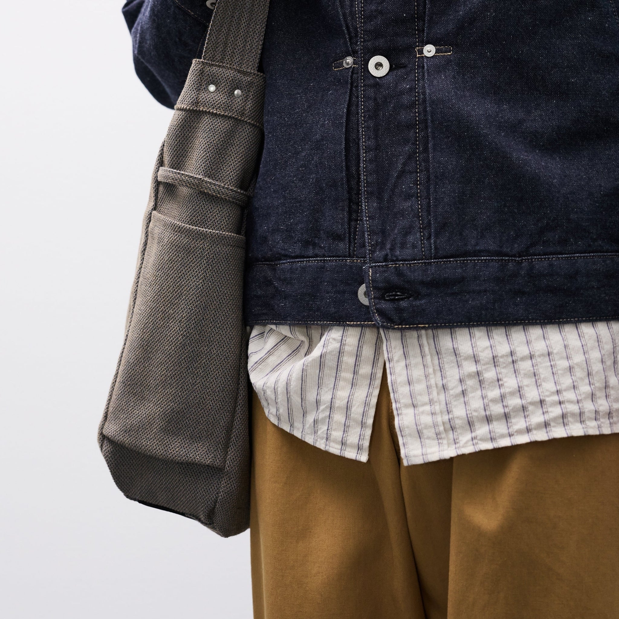 Detalje af lagdelt outfit fra Norse Projects